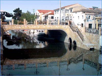 Lefkimi, the canal with the footbridge LEFKIMI (Small town) CORFU