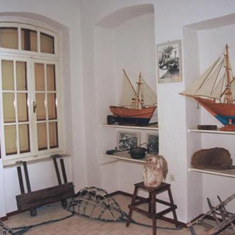 Gialos, a room of the Nautical Museum with paintings and ship models, GIALOS (Settlement) SYMI