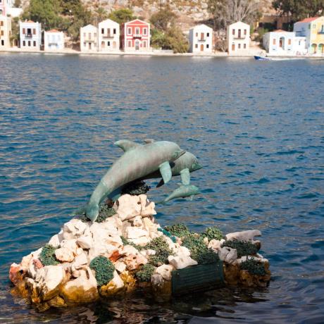 Dolphins statue at the Kastellorizo port, MEGISTI (Village) DODEKANISSOS