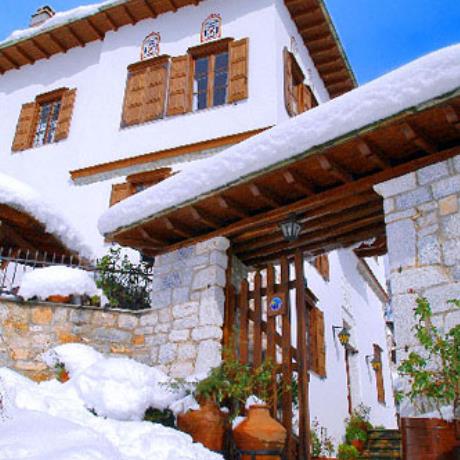 Traditional house covered by snow, MAKRINITSA (Village) VOLOS