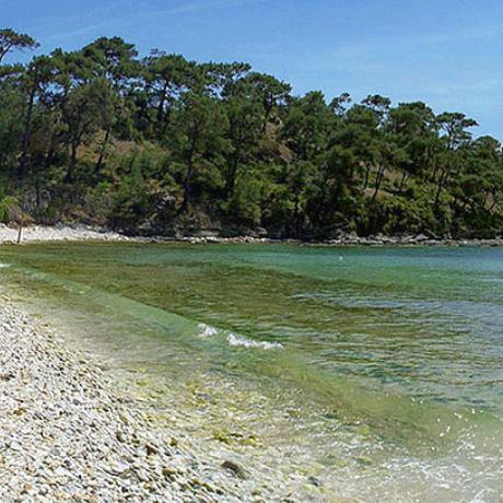 Alyki - the beach is next to a rock with ancient monuments that ends to a cape, ALYKI (Settlement) THASSOS