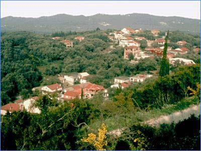 Agios Mattheos, view to village and to green hill AGIOS MATTHEOS (Small town) CORFU