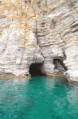Kastos, a bit north from the port is a small cave with a sandy beach inside, an old shelter of seals KASTOS (Village) IONIAN ISLANDS