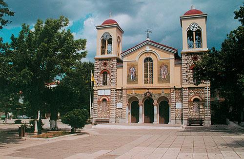A view of Kalavryta central square church - the left clock stopped when the German army started killing the manhood in 1943 KALAVRYTA (Small town) ACHAIA