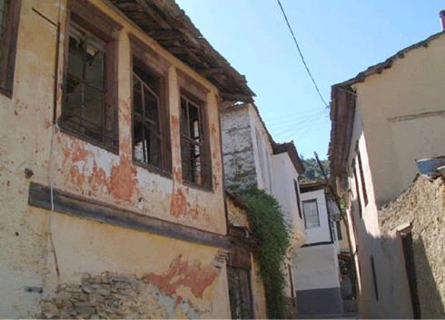 Eleftheroupoli - dilapidated buildings stand next to preserved ones in the old town ELEFTHEROUPOLI (Small town) KAVALA