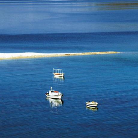Amorgos beaches; a narrow strip of sandy land & fishing boats moored nearby, AGIOS PAVLOS (Settlement) AMORGOS