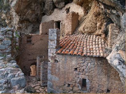 Atsicholos, Monastery Kalamiou - the church of the old monastery has been built inside the rock ATSICHOLOS (Village) GORTYS