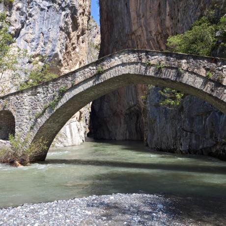The Venetikos river flows under Portitsa bridge to the omonymous canyon , VENETIKOS (Tributary) GREVENA