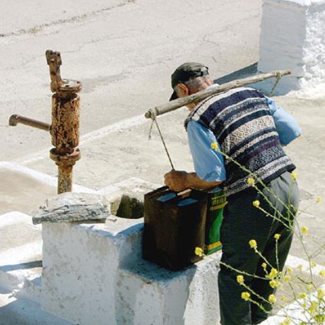 Man at a well of Chora, AMORGOS (Village) AMORGOS
