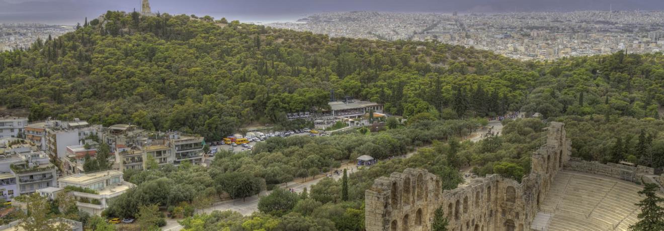 Herod's Odeum with Philopappos hill in the background