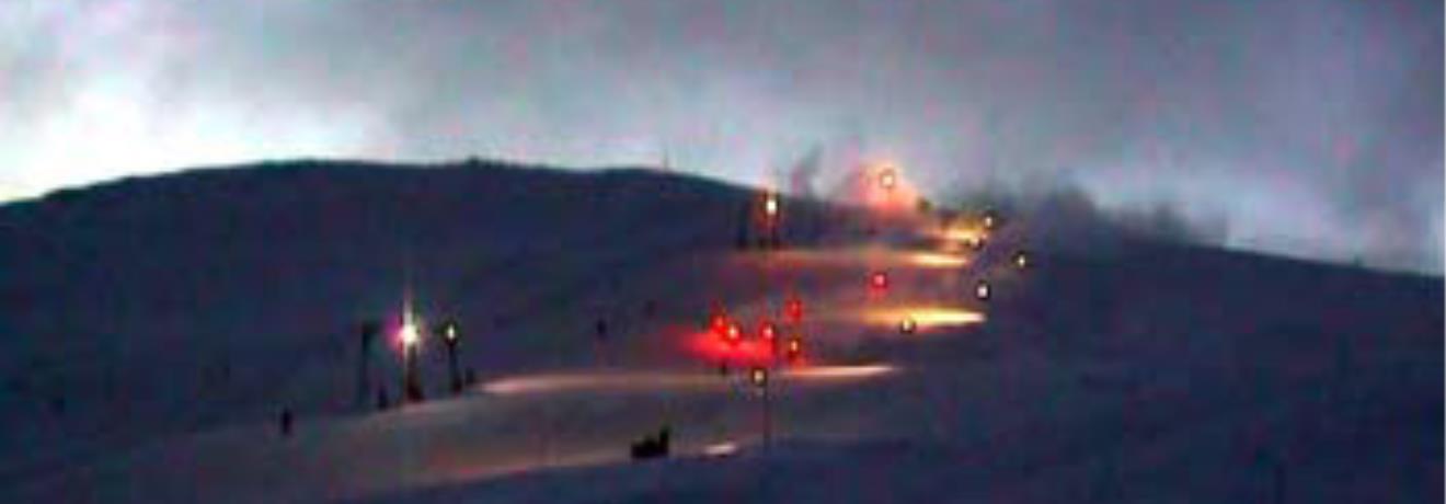 A lit-up slope for night skiing