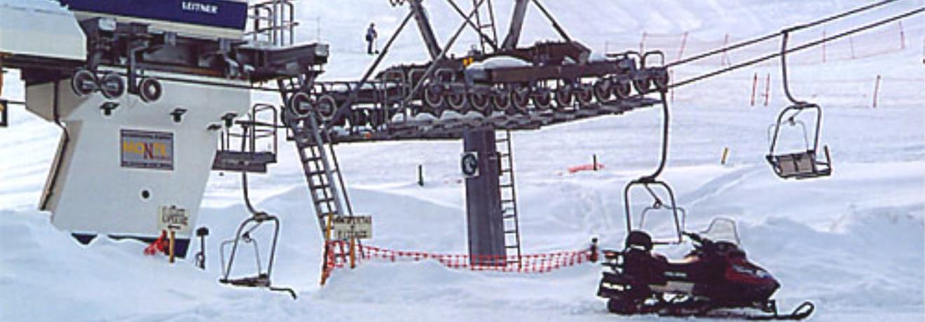 A snowmobile & lifts