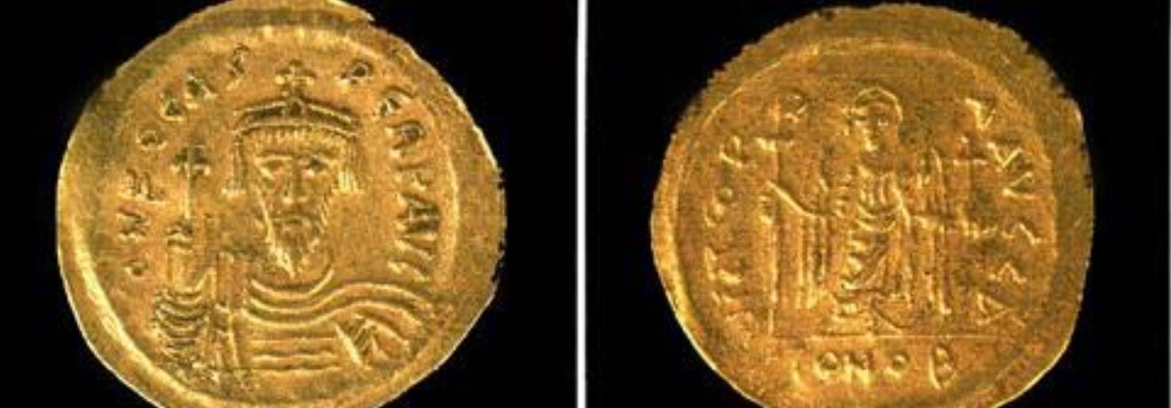 Two sides of a gold byzantine coin of the emperor Nikiforos Fokas era (602-610 AD)