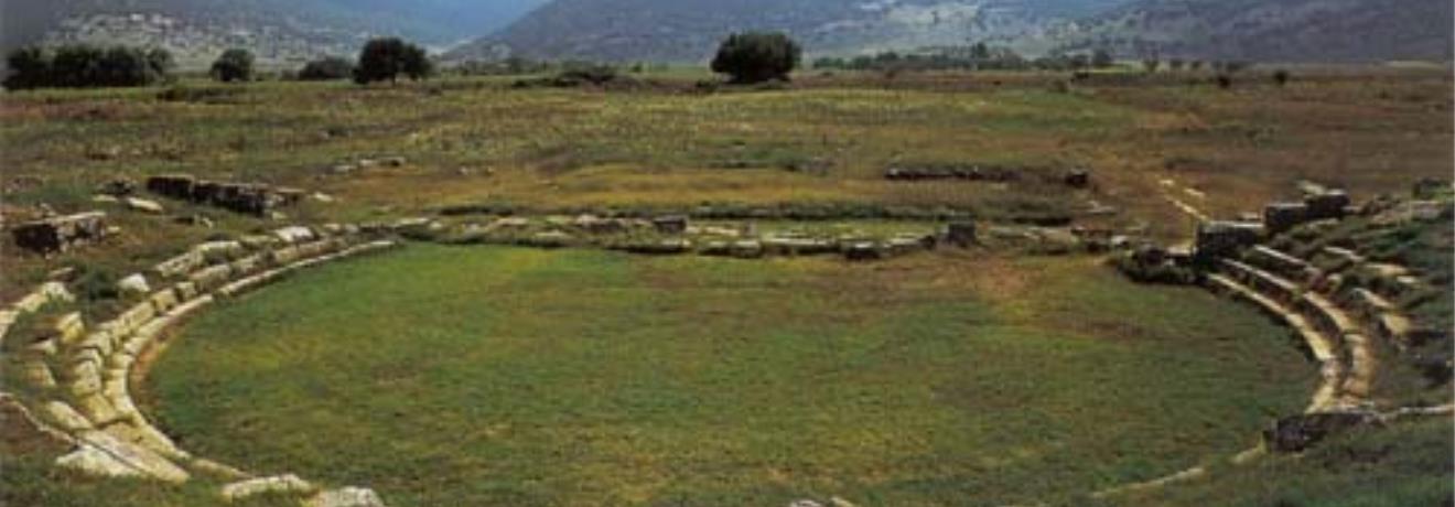 Archaeological Site of Ancient Mantineia - The little theater of Mantineia delimits the west side of the agora; its cavea was formed on a man-made fill