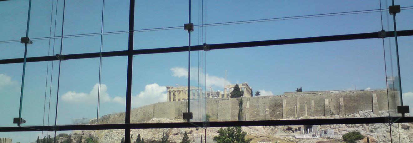 The museum glass walls never lose sight of the rock & its monuments