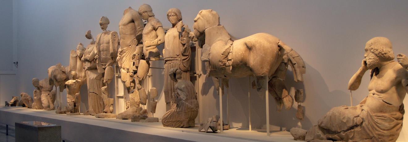 Chariot race between Pelops and Oinomaos with Zeus presiding in the centre. East pediment of Zeus' temple